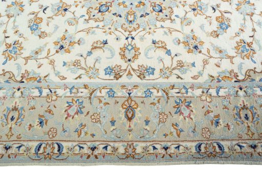Corner detail of New Kashan rug showing border pattern and Wool pile