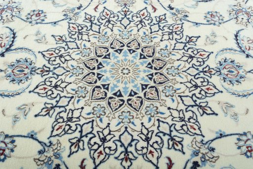 Central medallion detail of 2000s Nain rug from Iran / Persia