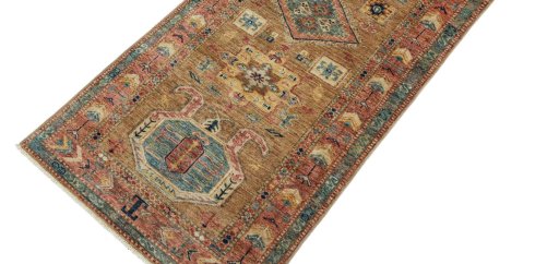 Backside of handmade New Kazak rug showing knot structure and weave density
