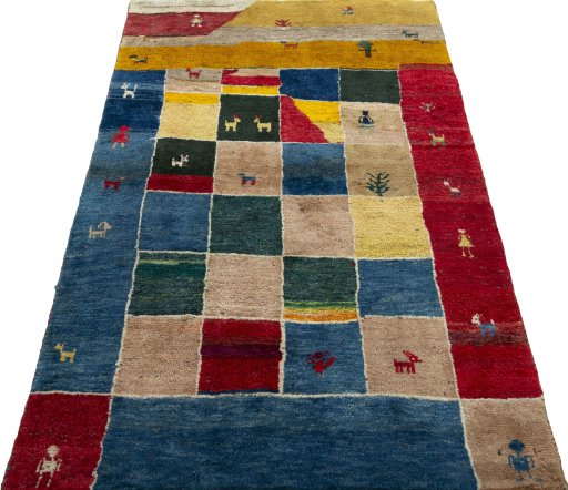 Surface texture of 2000s Persian Gabbeh rug with natural Wool and intricate pattern