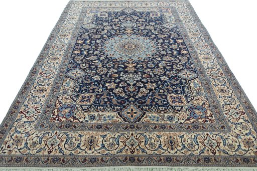Surface texture of 2000s Nain rug with natural Wool and intricate pattern
