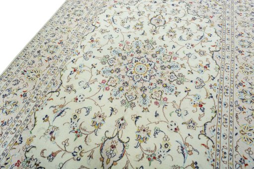 Backside of handmade New Kashan rug showing knot structure and weave density