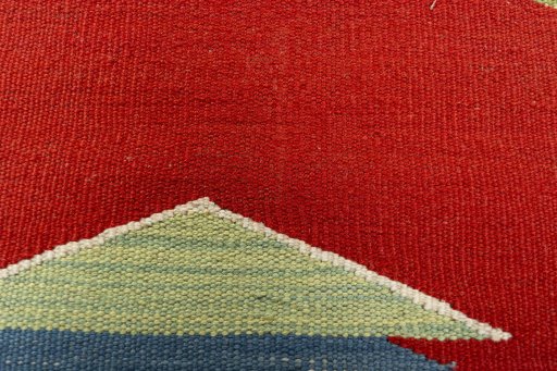 Backside of handmade New Kilim Dastan rug showing knot structure and weave density