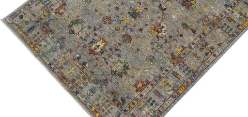 Backside of handmade New Farahan rug showing knot structure and weave density
