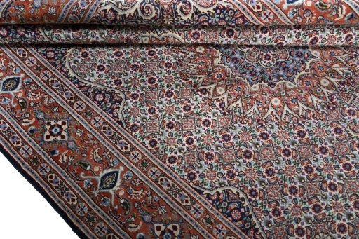 Close-up detail of 2000s Moud rug from Iran / Persia showing Wool weave