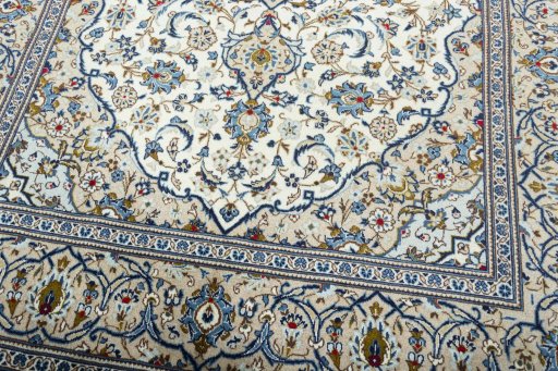 Close-up detail of 2000s Kashan rug from Iran / Persia showing Wool weave