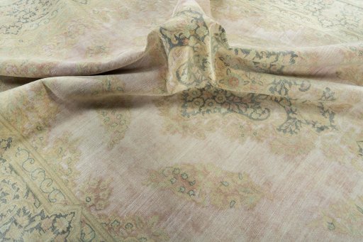 Surface texture of 1950s Vintage rug with natural Wool and intricate pattern