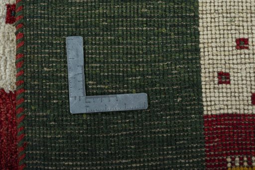 Close-up detail of 2000s Persian Gabbeh rug from Pakistan showing Wool weave