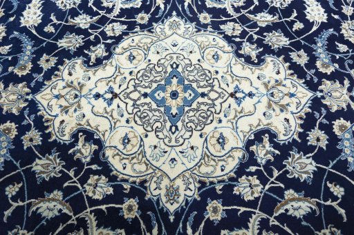 Central medallion detail of 2000s Nain rug from Iran / Persia