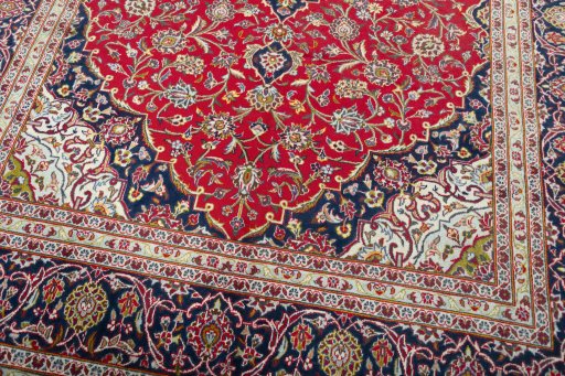 Close-up detail of 2000s Kashan rug from Iran / Persia showing Wool weave