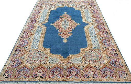 Surface texture of 1970s Kerman rug with natural Wool and intricate pattern