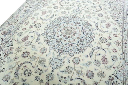 Backside of handmade 2000s Nain rug showing knot structure and weave density