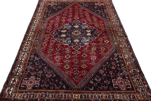 Surface texture of 2000s Shiraz rug with natural Wool and intricate pattern