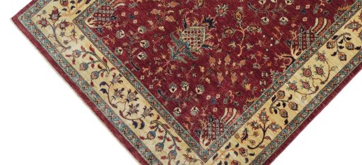 Backside of handmade New Farahan rug showing knot structure and weave density