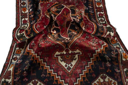 Close-up detail of 2000s Shiraz rug from Iran / Persia showing Wool weave