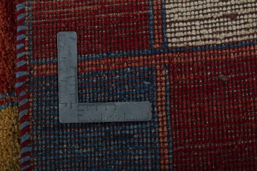 Close-up detail of 2000s Persian Gabbeh rug from Pakistan showing Wool weave