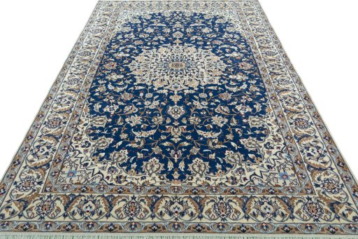 Surface texture of 2000s Nain rug with natural Wool and intricate pattern