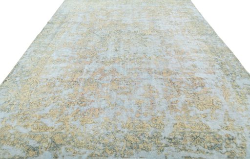 Surface texture of 1950s Vintage rug with natural Wool and intricate pattern