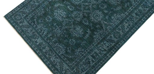 Backside of handmade New Farahan rug showing knot structure and weave density