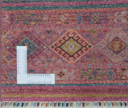 Corner detail of New Samarkand rug showing border pattern and Wool pile