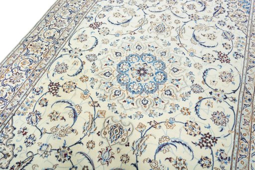 Backside of handmade New Nain rug showing knot structure and weave density