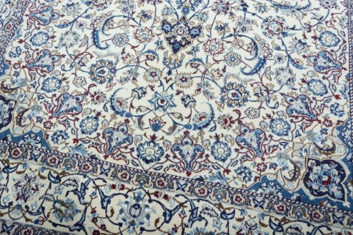 Close-up detail of 2000s Nain rug from Iran / Persia showing Wool weave