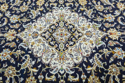 Central medallion detail of 2000s Kashan rug from Iran / Persia