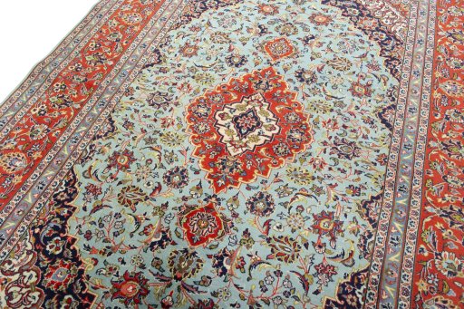 Backside of handmade New Kashan rug showing knot structure and weave density