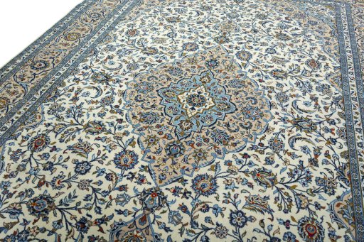 Backside of handmade 2000s Kashan rug showing knot structure and weave density