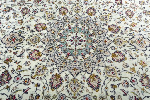 Central medallion detail of 2000s Kashan rug from Iran / Persia