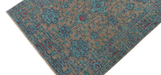 Backside of handmade New Farahan rug showing knot structure and weave density
