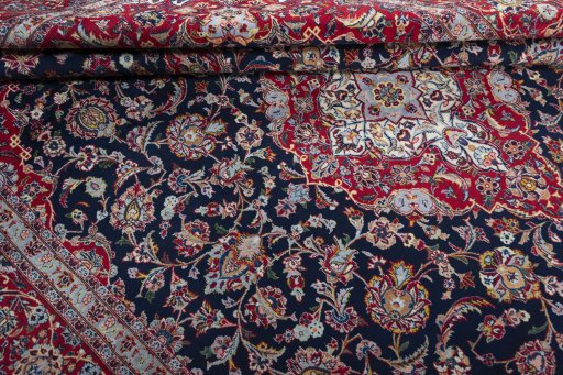 Close-up detail of 2000s Kashan rug from Iran / Persia showing Cork weave