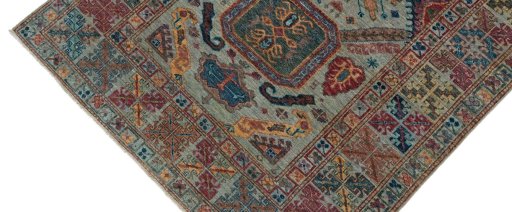 Backside of handmade New Kazak rug showing knot structure and weave density