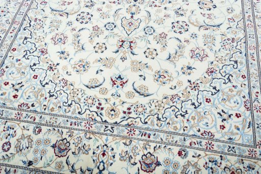 Close-up detail of 2000s Nain rug from Iran / Persia showing Wool weave