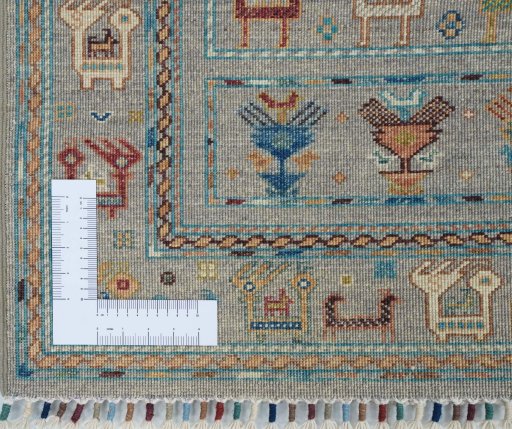 Corner detail of New Samarkand rug showing border pattern and Wool pile