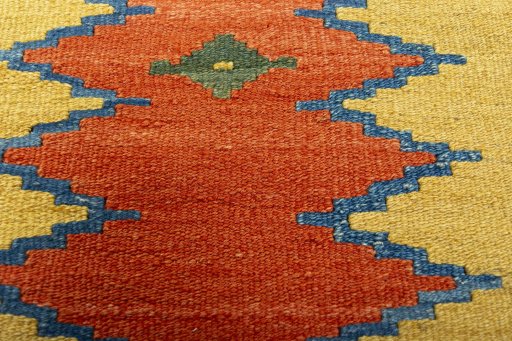 Backside of handmade New Modern Design rug showing knot structure and weave density