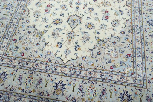 Close-up detail of 2000s Kashan rug from Iran / Persia showing Wool weave
