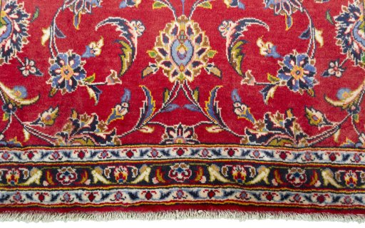 Close-up detail of 2000s Kashan rug from Iran / Persia showing Wool weave
