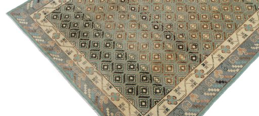 Backside of handmade New Farahan rug showing knot structure and weave density