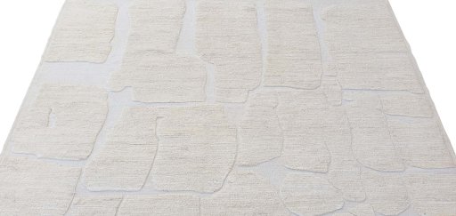 Backside of handmade New Morocco rug showing knot structure and weave density