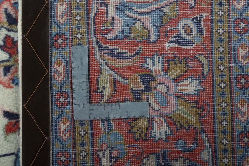 Backside of handmade 2000s Sarough rug showing knot structure and weave density