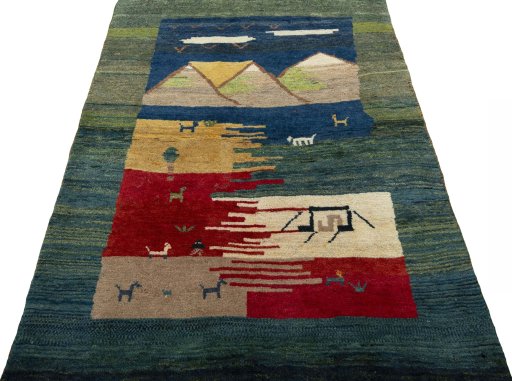 Surface texture of 2000s Persian Gabbeh rug with natural Wool and intricate pattern