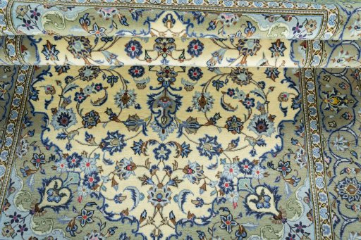Close-up detail of 2000s Kashan rug from Iran / Persia showing Wool weave