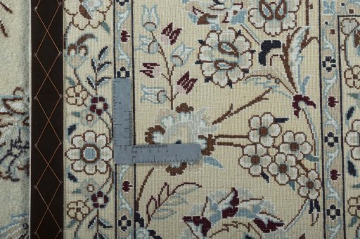 Backside of handmade 2000s Nain rug showing knot structure and weave density