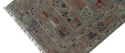 Backside of handmade New Samarkand rug showing knot structure and weave density