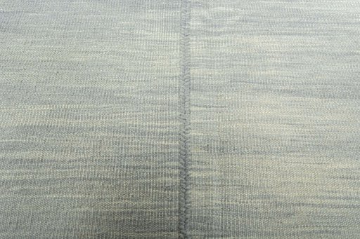 Backside of handmade New Kilim Kiasar rug showing knot structure and weave density
