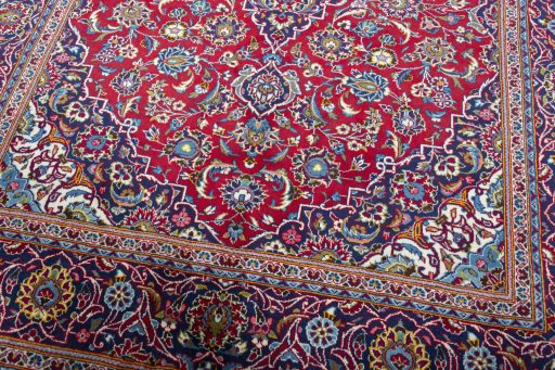 Close-up detail of New Kashan rug from Iran / Persia showing Wool weave