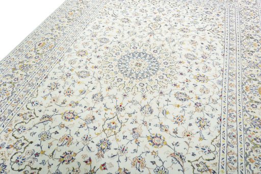 Backside of handmade 2000s Kashan rug showing knot structure and weave density