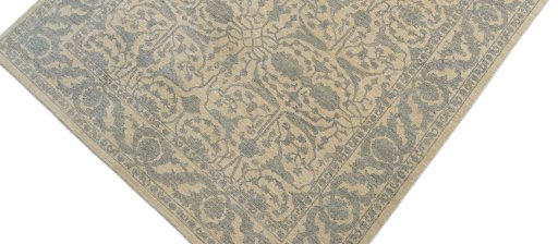 Backside of handmade New Farahan rug showing knot structure and weave density