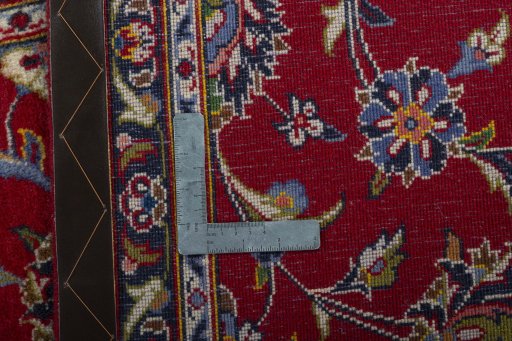 Surface texture of 2000s Kashan rug with natural Wool and intricate pattern